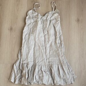 Chic Beige Mini Dress with Ruffle Hem